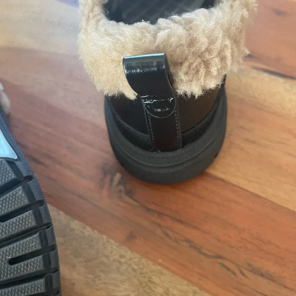 CHANEL Black and Brown Shearling Sneakers